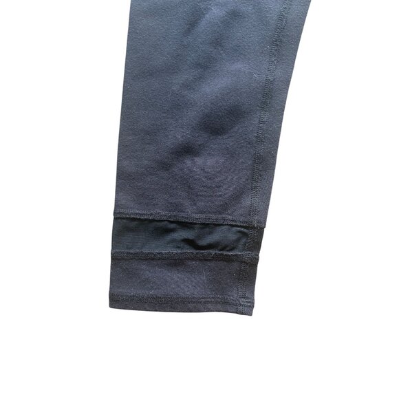 ALO Yoga High-Waisted Cropped Legging With Mesh Panels in Black - Picture 3 of 5